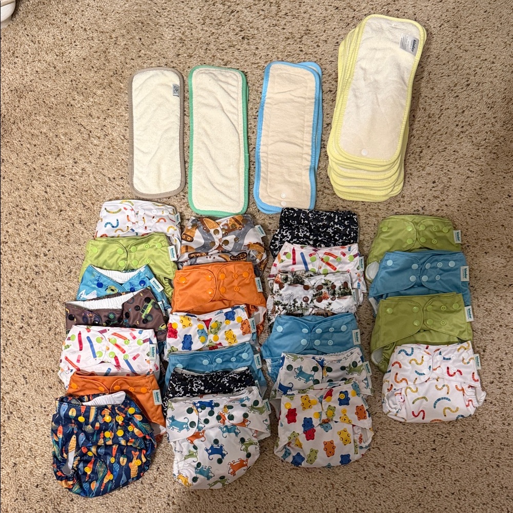 Large set of never used cloth diapers
